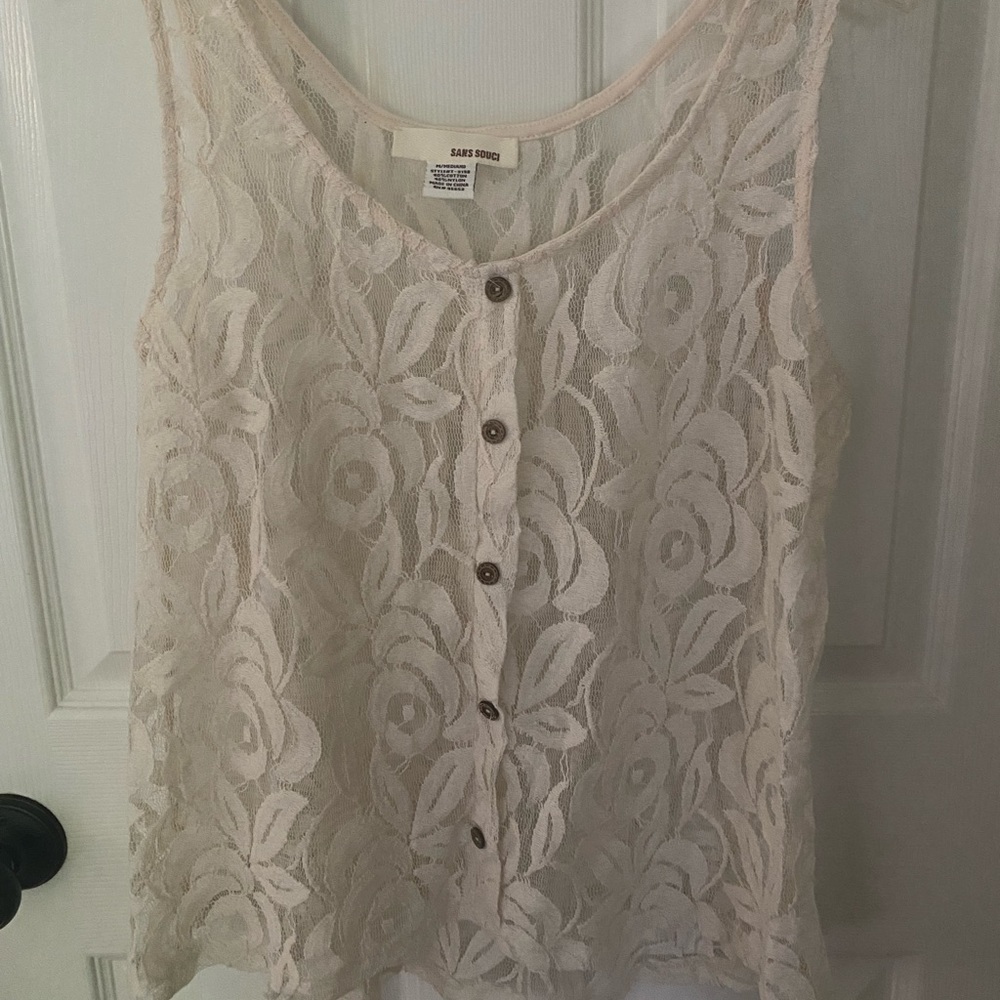 Lacey tank top or coverlet with buttons down the front. Excellent condition!